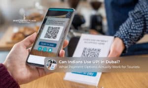 Indian tourist using UPI for payments at a Dubai merchant.