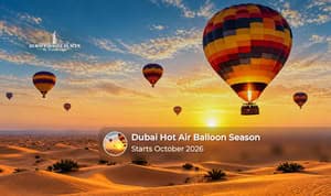 Hot air balloons rising over the Dubai desert during the early morning season.