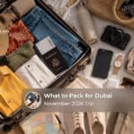 Lightweight clothing, comfortable walking shoes, sunglasses, and travel essentials packed for a Dubai holiday in November.